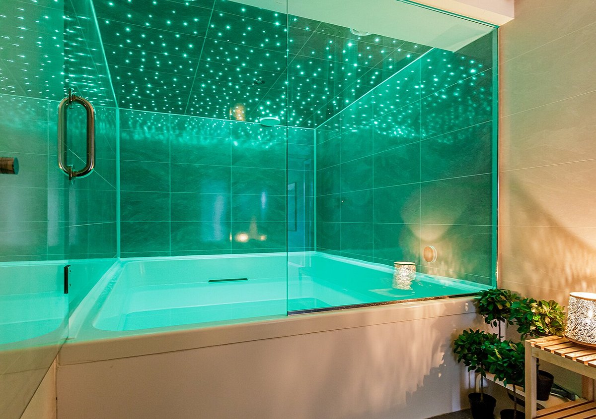 Bergen harbour with colourful Bryggen wharf buildings reflected in the water