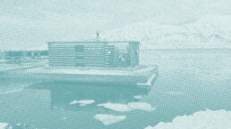 Arctic sauna cabin at the edge of the ice with Svalbard glacier landscape behind